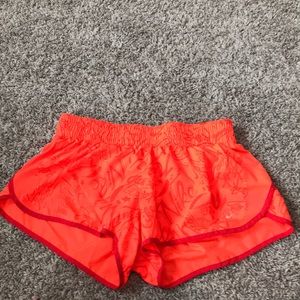 Neon Nike shorts